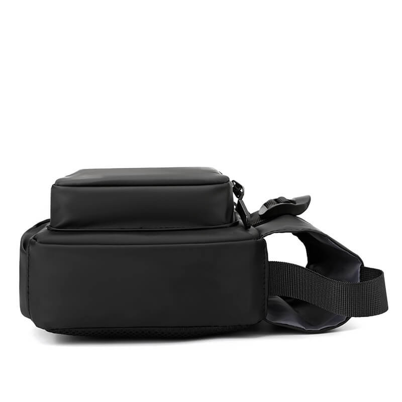 Side view of black men's crossbody bag with USB-port and arcuate strap.